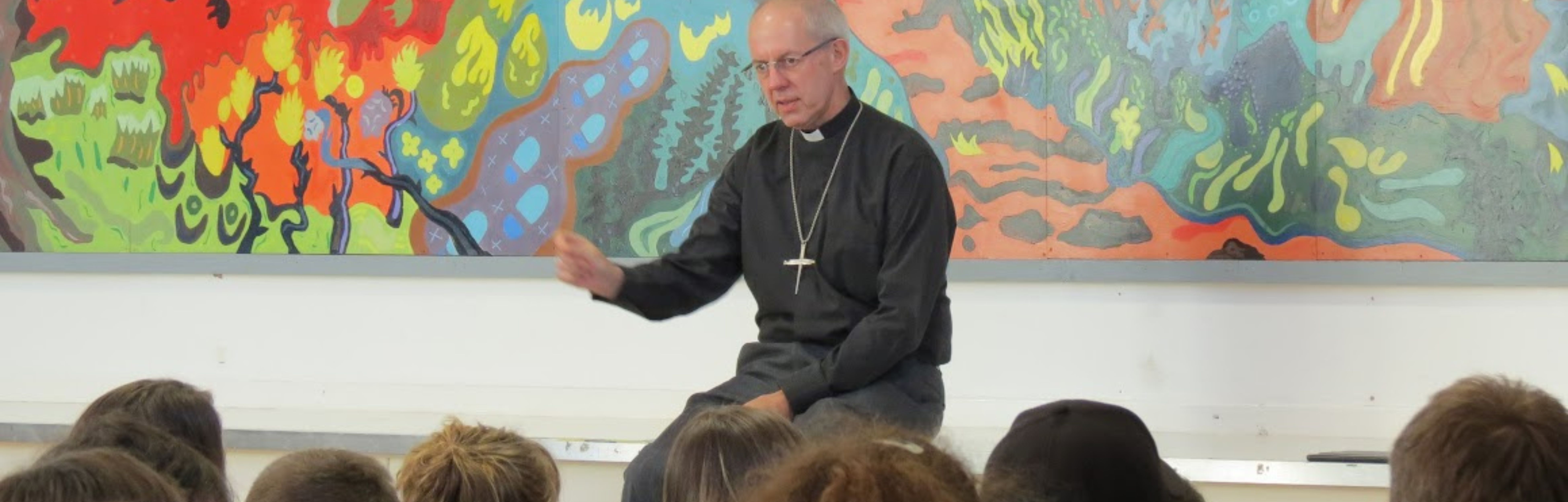 The Archbishop of Canterbury talks with students during his last visit to Bath and Wells in 2016.