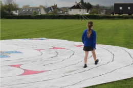 Pupil walking labyrinth outside