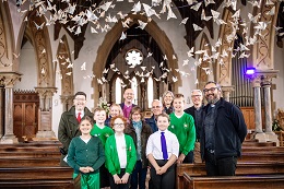 Bishop Michael at Highbridge with school children and origami butterflies
