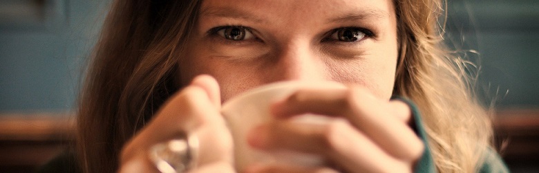 Woman holding hot drink