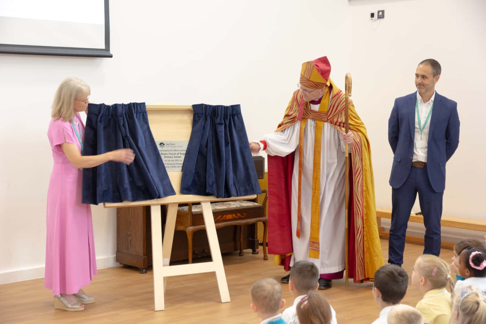 Bishop unveiling Two Rivers School Plaque