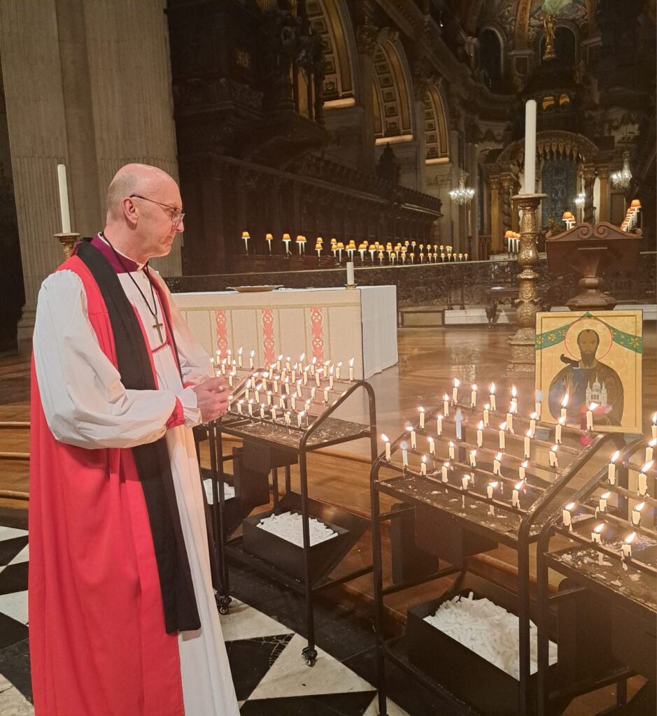 Bishop Michael at St Paul's Cathedral viewing the prayer candles after he preached at the Barts and St Joseph's Annual Service of Remembrance.